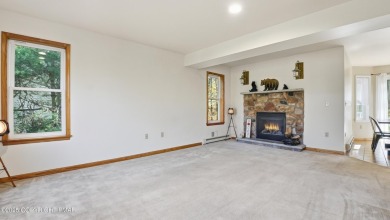 WELCOME TO 104 WOLF HOLLOW RD, A GOLF LOVERS DREAM!! This