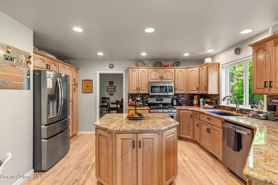 This spacious 6 BR/4 BA home is situated on nearly an acre in - photo 6