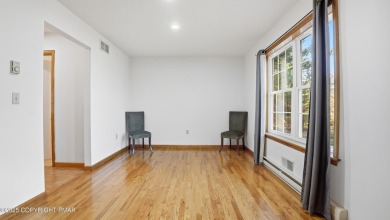 WELCOME TO 104 WOLF HOLLOW RD, A GOLF LOVERS DREAM!! This