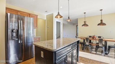 WELCOME TO 104 WOLF HOLLOW RD, A GOLF LOVERS DREAM!! This