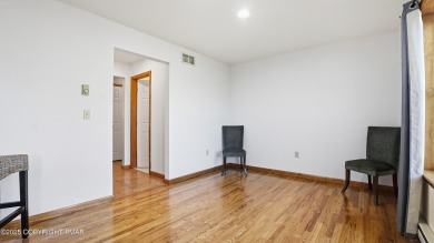 WELCOME TO 104 WOLF HOLLOW RD, A GOLF LOVERS DREAM!! This