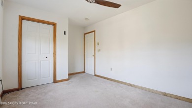 WELCOME TO 104 WOLF HOLLOW RD, A GOLF LOVERS DREAM!! This