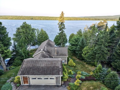 Check out this private St. Froid Lake waterfront home with an - photo 1