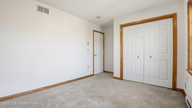 WELCOME TO 104 WOLF HOLLOW RD, A GOLF LOVERS DREAM!! This