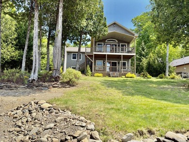 Check out this private St. Froid Lake waterfront home with an - photo 4