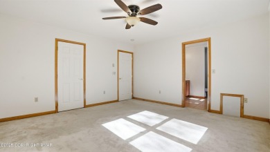 WELCOME TO 104 WOLF HOLLOW RD, A GOLF LOVERS DREAM!! This