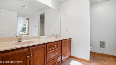 WELCOME TO 104 WOLF HOLLOW RD, A GOLF LOVERS DREAM!! This