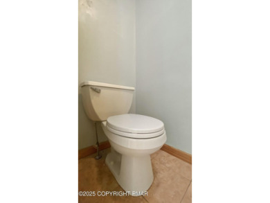 WELCOME TO 104 WOLF HOLLOW RD, A GOLF LOVERS DREAM!! This