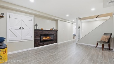 WELCOME TO 104 WOLF HOLLOW RD, A GOLF LOVERS DREAM!! This