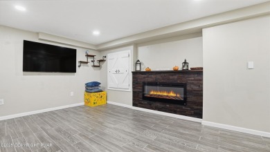 WELCOME TO 104 WOLF HOLLOW RD, A GOLF LOVERS DREAM!! This