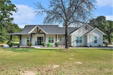 Lake Home For Sale in Poolville, Texas