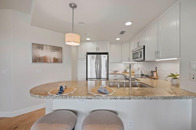 Stunning third-floor condo with serene hill views, flooding the