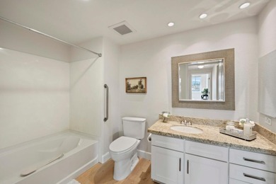 Stunning third-floor condo with serene hill views, flooding the