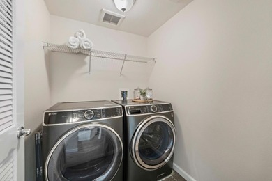 Stunning third-floor condo with serene hill views, flooding the