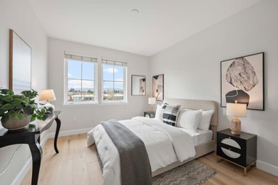 Stunning third-floor condo with serene hill views, flooding the