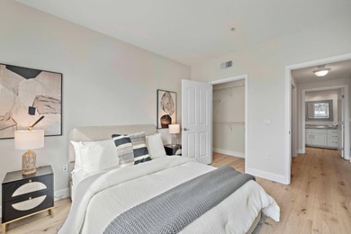 Stunning third-floor condo with serene hill views, flooding the