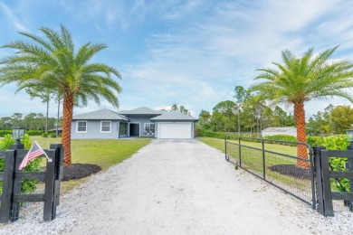 Lake Home For Sale in The Acreage, Florida