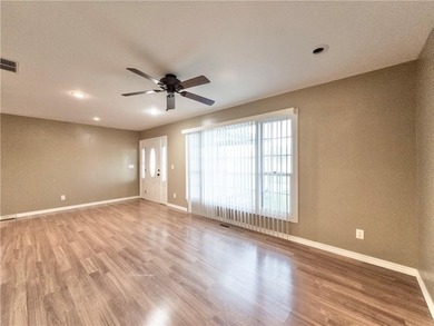 This well-kept five-bedroom, three-bath home offers over 3,700