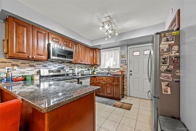 This well-designed two-unit property offers a flexible layout - photo 4