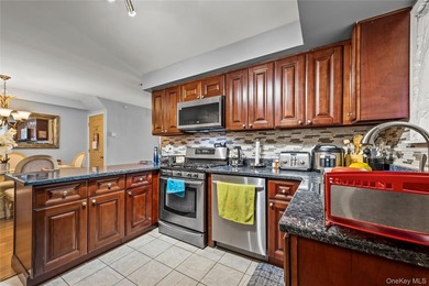 This well-designed two-unit property offers a flexible layout - photo 5