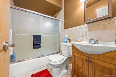 This well-designed two-unit property offers a flexible layout - photo 9