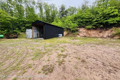 A Rare Upper Peninsula Waterfront Opportunity Established in - photo 46