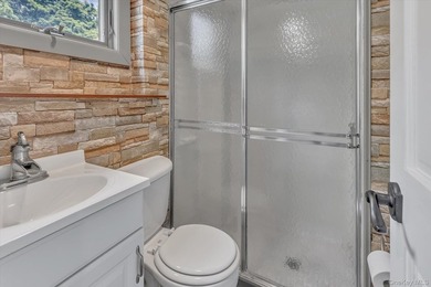 Beautifully updated 4-bedroom, 4-full-bath Expanded Split set on - photo 22