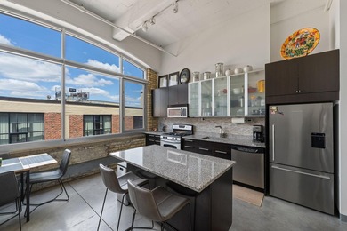 Live in the heart of the North Loop at Tower Lofts. This - photo 2