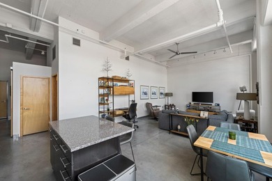 Live in the heart of the North Loop at Tower Lofts. This - photo 3
