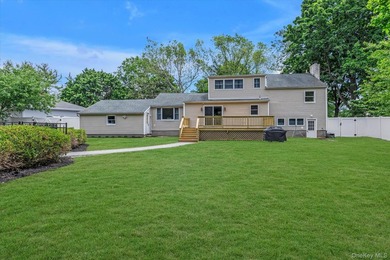 Beautifully updated 4-bedroom, 4-full-bath Expanded Split set on - photo 26