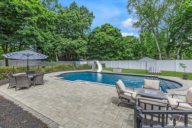 Beautifully updated 4-bedroom, 4-full-bath Expanded Split set on - photo 27