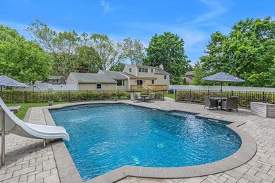 Beautifully updated 4-bedroom, 4-full-bath Expanded Split set on - photo 28