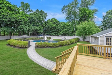 Beautifully updated 4-bedroom, 4-full-bath Expanded Split set on - photo 30