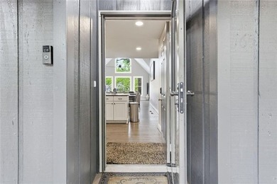 Lakefront living on Lake Arrowhead takes center stage here, with - photo 9