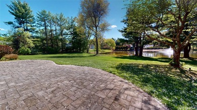Framed by sweeping pond views and surrounded by over 2 private - photo 35