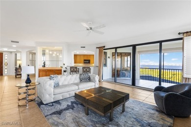 FREE Golf Cart Included! | Spectacular Riverfront Living in - photo 2