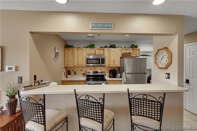 Top-floor, two-story lakefront living in the heart of Osage - photo 11
