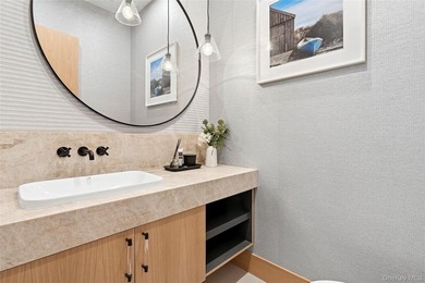 Newly completed and design-driven, this waterfront home makes a - photo 11