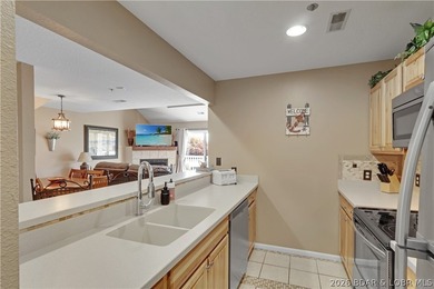 Top-floor, two-story lakefront living in the heart of Osage - photo 12