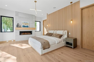 Newly completed and design-driven, this waterfront home makes a - photo 12
