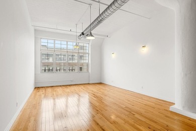 Authentic Loft Living at The Chocolate Factory! Welcome to your - photo 2
