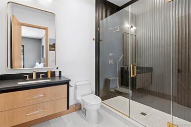 Newly completed and design-driven, this waterfront home makes a - photo 17
