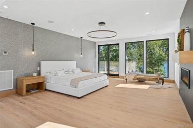 Newly completed and design-driven, this waterfront home makes a - photo 19