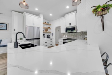 Finding a beautifully renovated home isn't difficult. Finding - photo 21