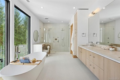 Newly completed and design-driven, this waterfront home makes a - photo 21