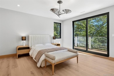 Newly completed and design-driven, this waterfront home makes a - photo 23