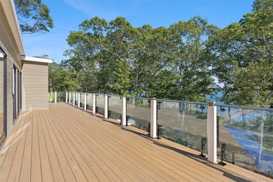 Newly completed and design-driven, this waterfront home makes a - photo 25