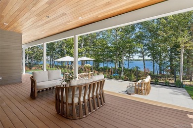 Newly completed and design-driven, this waterfront home makes a - photo 26