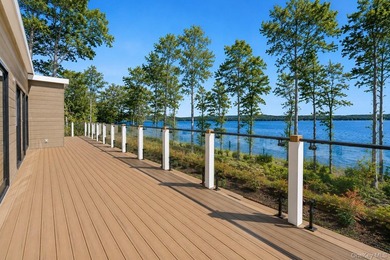 Newly completed and design-driven, this waterfront home makes a - photo 27