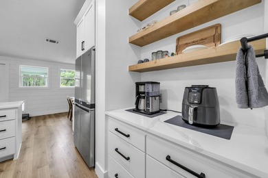 Finding a beautifully renovated home isn't difficult. Finding - photo 28